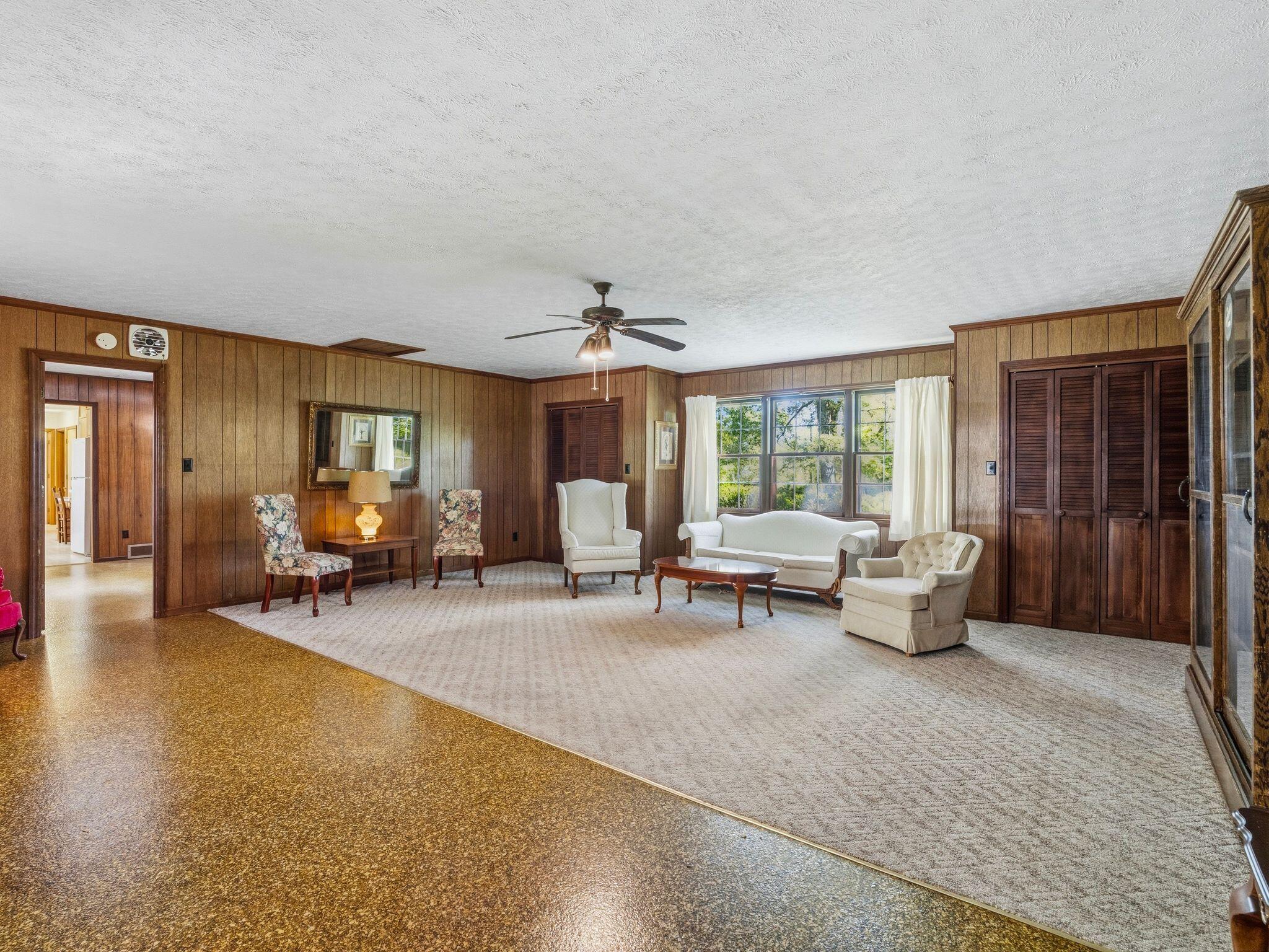 1115 Robin Ridge Road Henry, VA 24102 - Photo 17 of 54 a living room with furniture and a large window