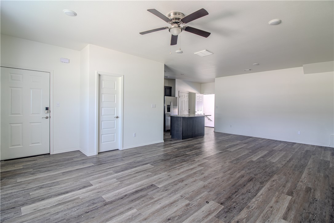 803 South Rupple Road, Unit 1 Fayetteville, AR 72704 - Photo 5 of 22 Open-concept living space with wood-finish flooring, recessed lighting, and a ceiling fan