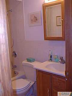 10 Fox Road Edison, NJ 08817 - Photo 6 of 8 a bathroom with a sink toilet and mirror