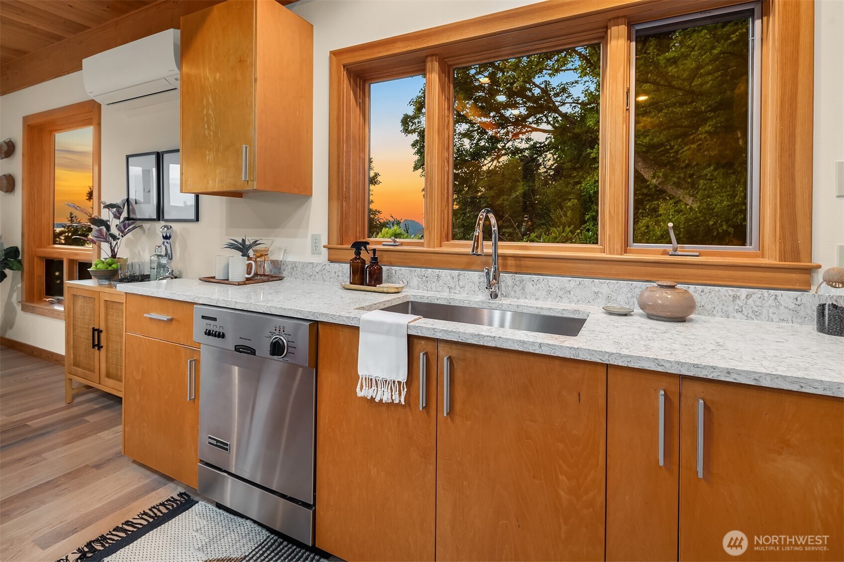 1002 Chuckanut Drive Bellingham, WA 98229 - Photo 11 of 40 a bathroom with a granite countertop sink and a large mirror next to a window