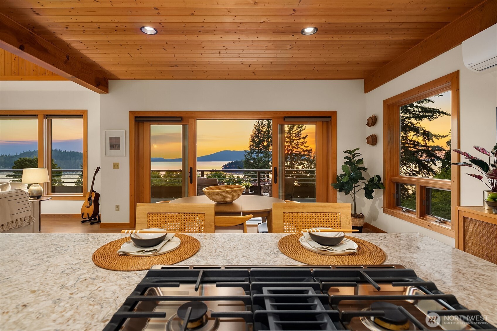 1002 Chuckanut Drive Bellingham, WA 98229 - Photo 12 of 40 a room with furniture and a floor to ceiling window