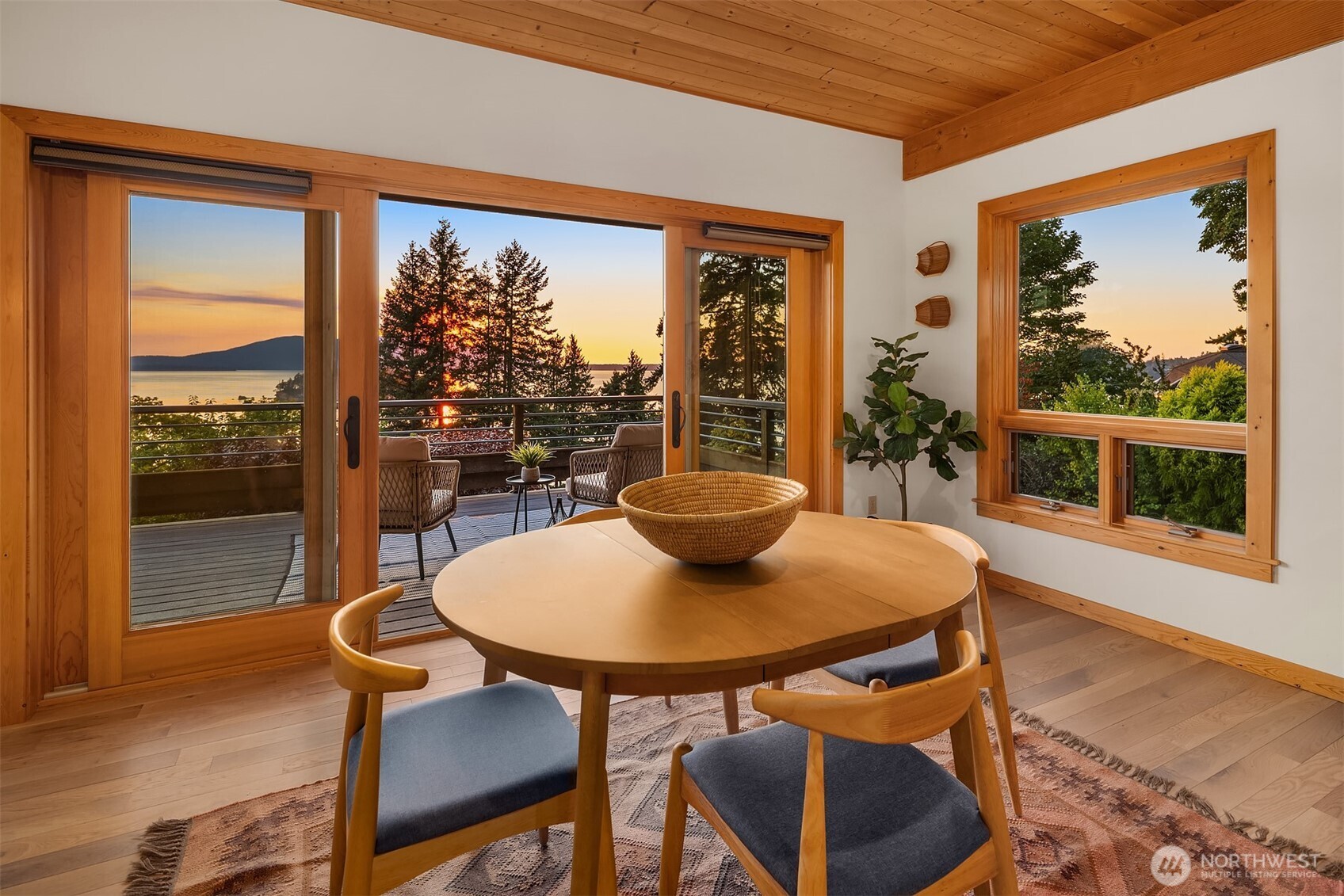 1002 Chuckanut Drive Bellingham, WA 98229 - Photo 15 of 40 a view of a dining room with furniture window and wooden floor