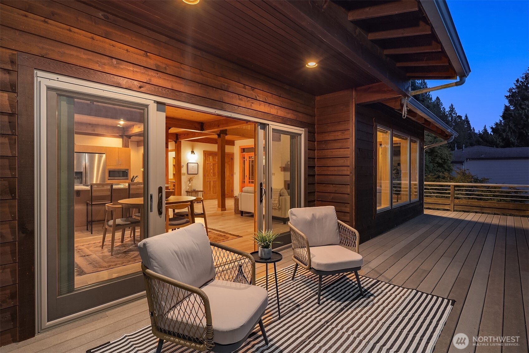 1002 Chuckanut Drive Bellingham, WA 98229 - Photo 30 of 40 a balcony with furniture and wooden floor
