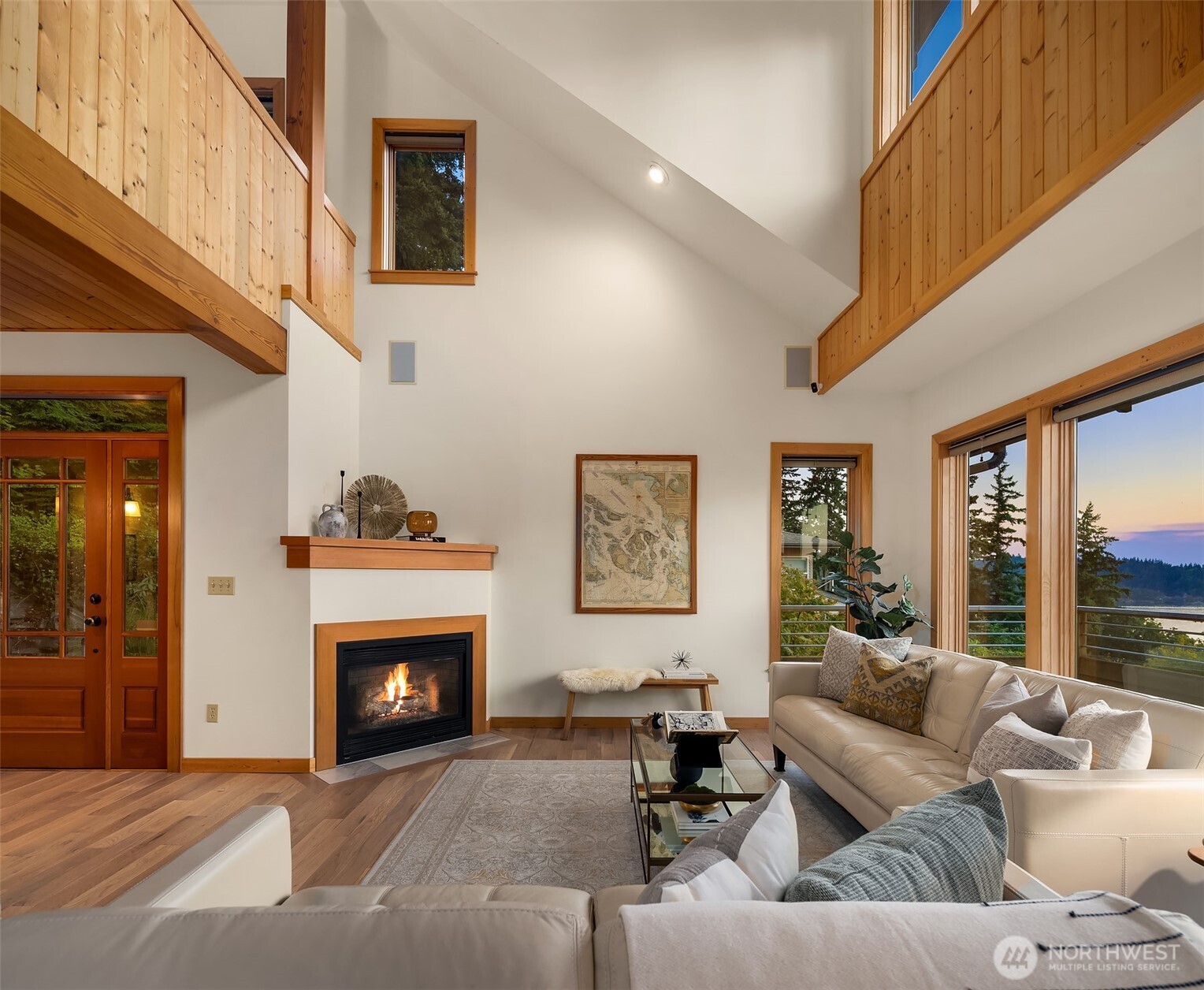 1002 Chuckanut Drive Bellingham, WA 98229 - Photo 6 of 40 a living room with furniture and a fireplace