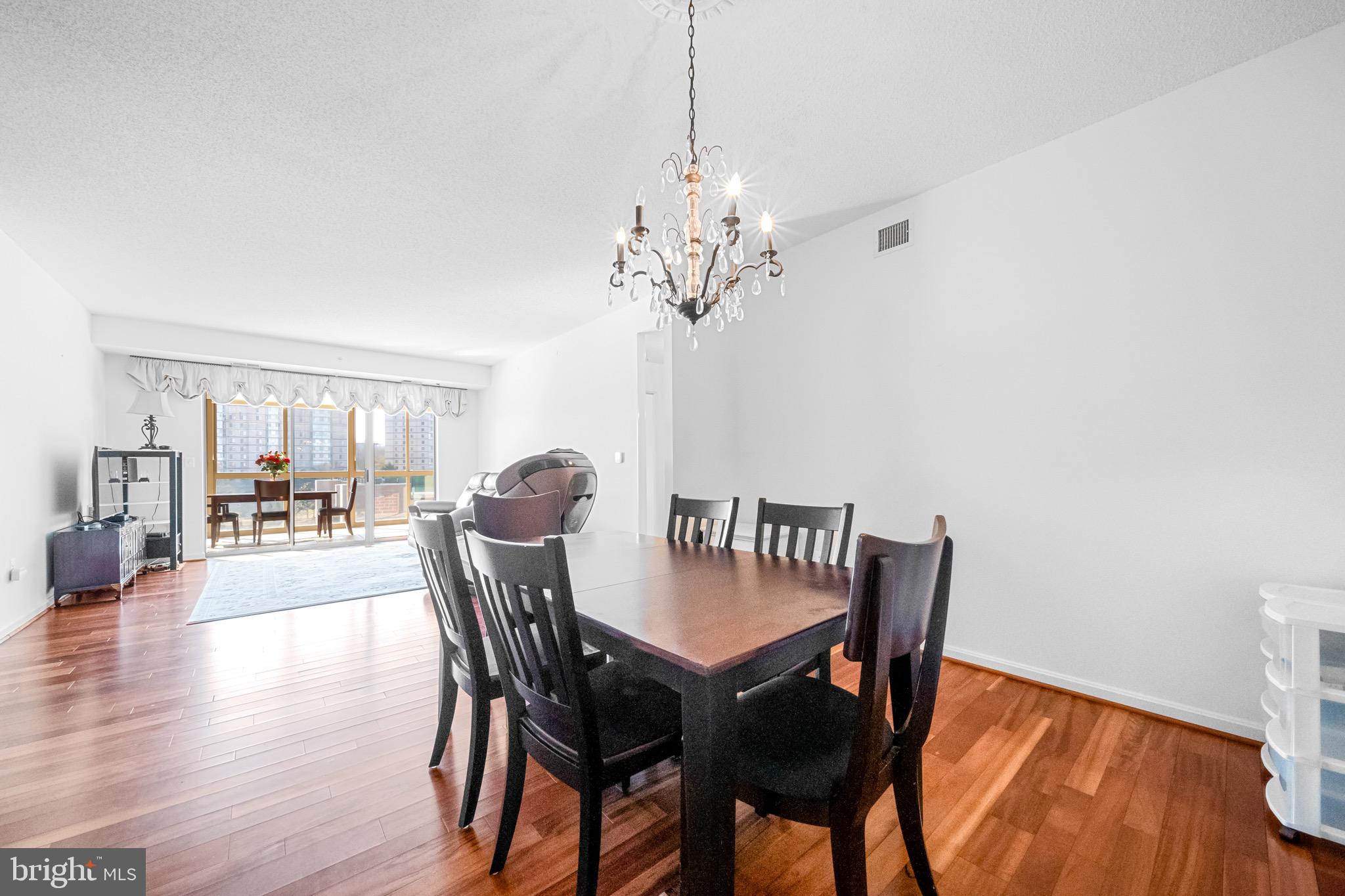 19360 Magnolia Grove Square, Unit 412 Leesburg, VA 20176 - Photo 19 of 28 Dining and Living Rooms