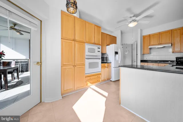 $395,000 | 19360 Magnolia Grove Square, Unit 412, Leesburg, VA 20176