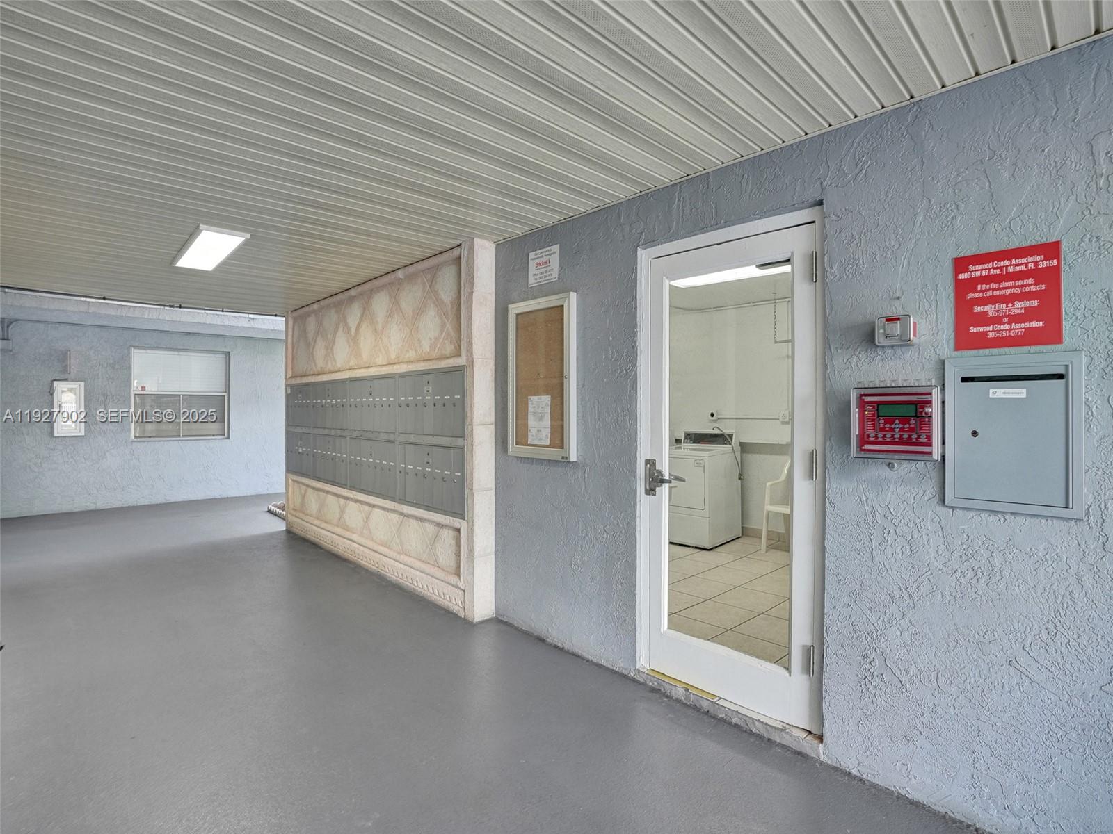 4600 Southwest 67th Avenue, Unit 235 Miami, FL 33155 - Photo 35 of 40 an empty room with windows