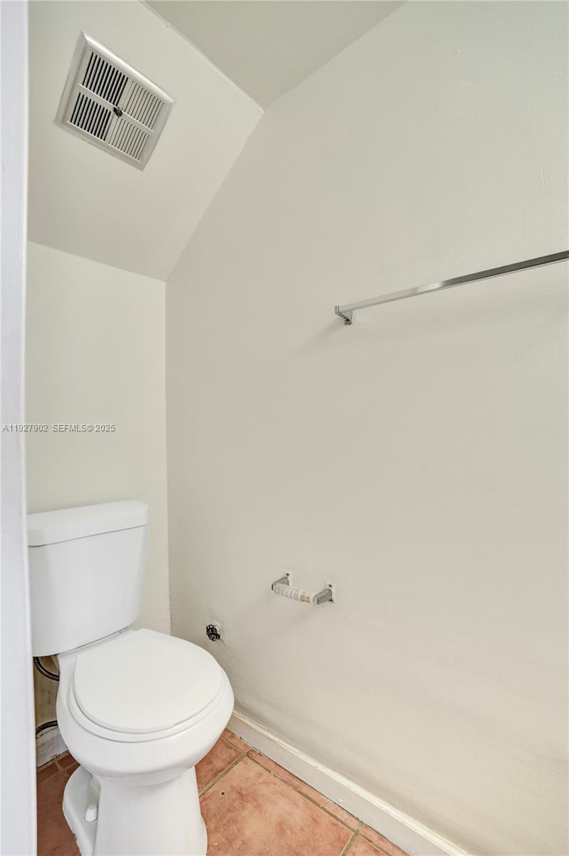 4600 Southwest 67th Avenue, Unit 235 Miami, FL 33155 - Photo 10 of 40 a white toilet sitting next to a shower