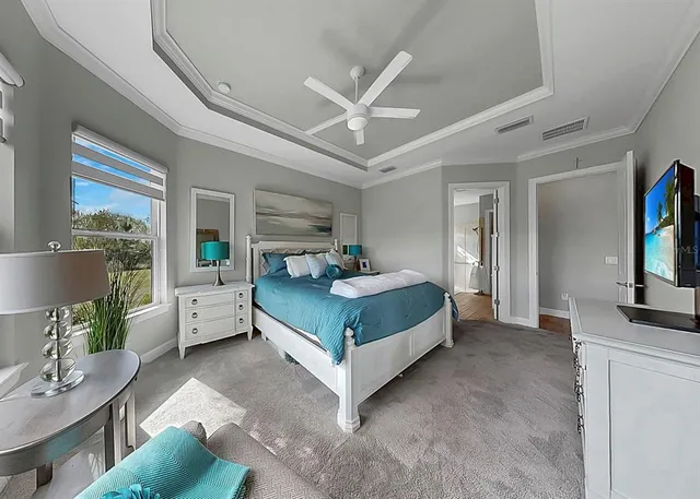 a bathroom with a granite countertop sink a toilet and a mirror
