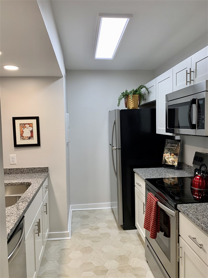 3803 Chimney Ridge Place, Unit 207 Durham, NC 27713 - Photo 10 of 27 New Stainless Appliances include the Dishwasher, Electric Range, and the Refrigerator. Appliances Convey!
