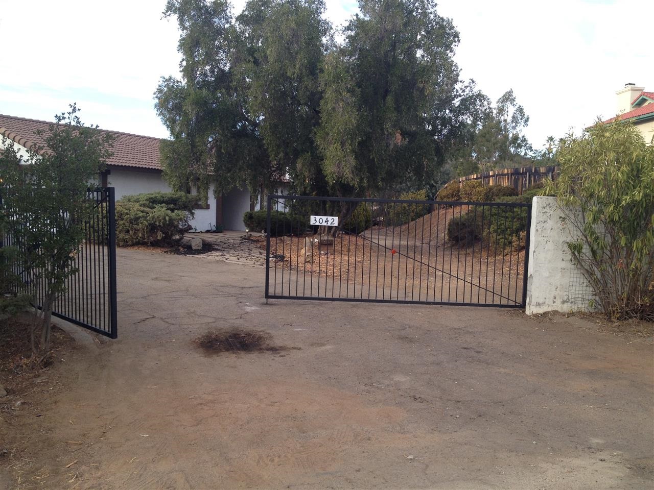 3042 Holly Road Alpine, CA 91901 - Photo 18 of 22 Gated driveway
