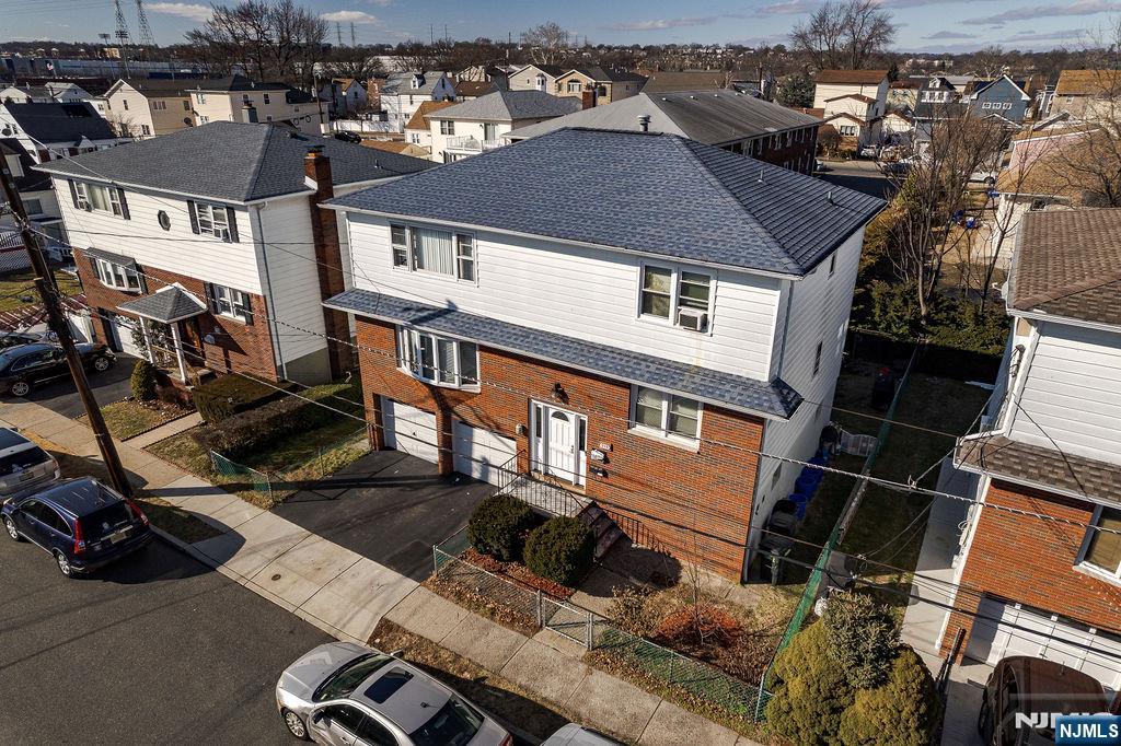 715 Tyler Street Lyndhurst, NJ 07071 - Photo 2 of 14 an aerial view of a house with a yard