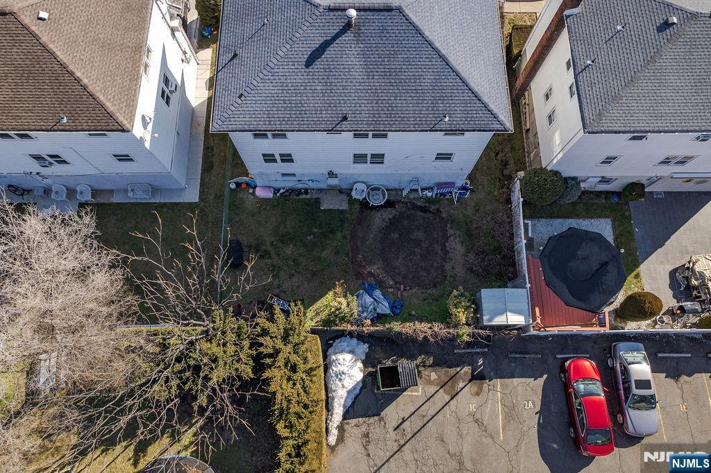 715 Tyler Street Lyndhurst, NJ 07071 - Photo 6 of 14 an aerial view of a house with a yard