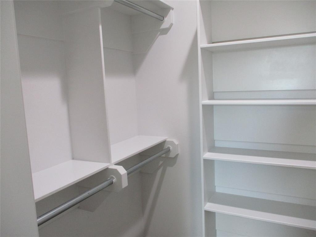 207 Mill Street Emory, TX 75440 - Photo 23 of 34 a view of an empty walk in closet