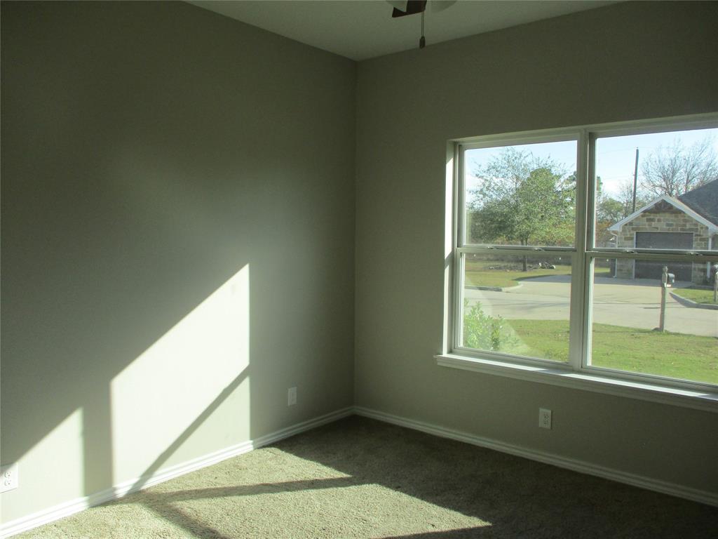 207 Mill Street Emory, TX 75440 - Photo 31 of 34 an empty room with a window