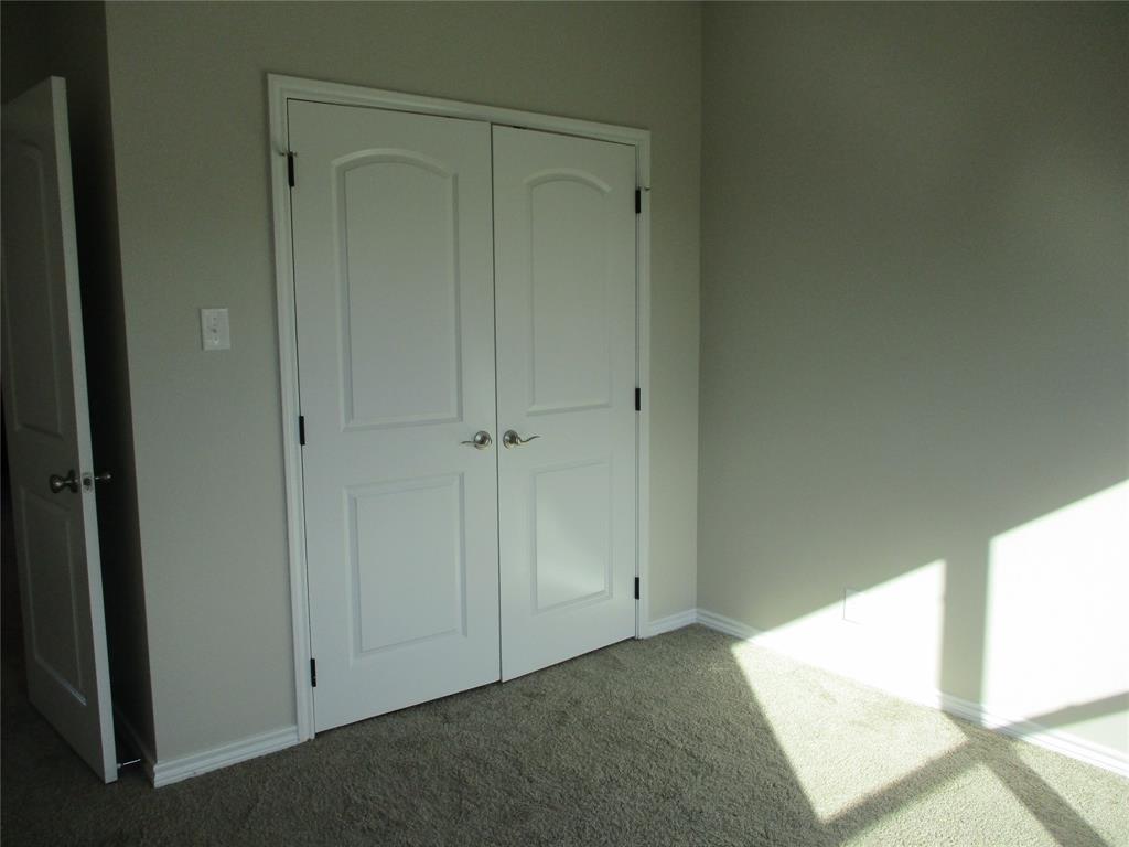 207 Mill Street Emory, TX 75440 - Photo 32 of 34 a view of an empty room and window