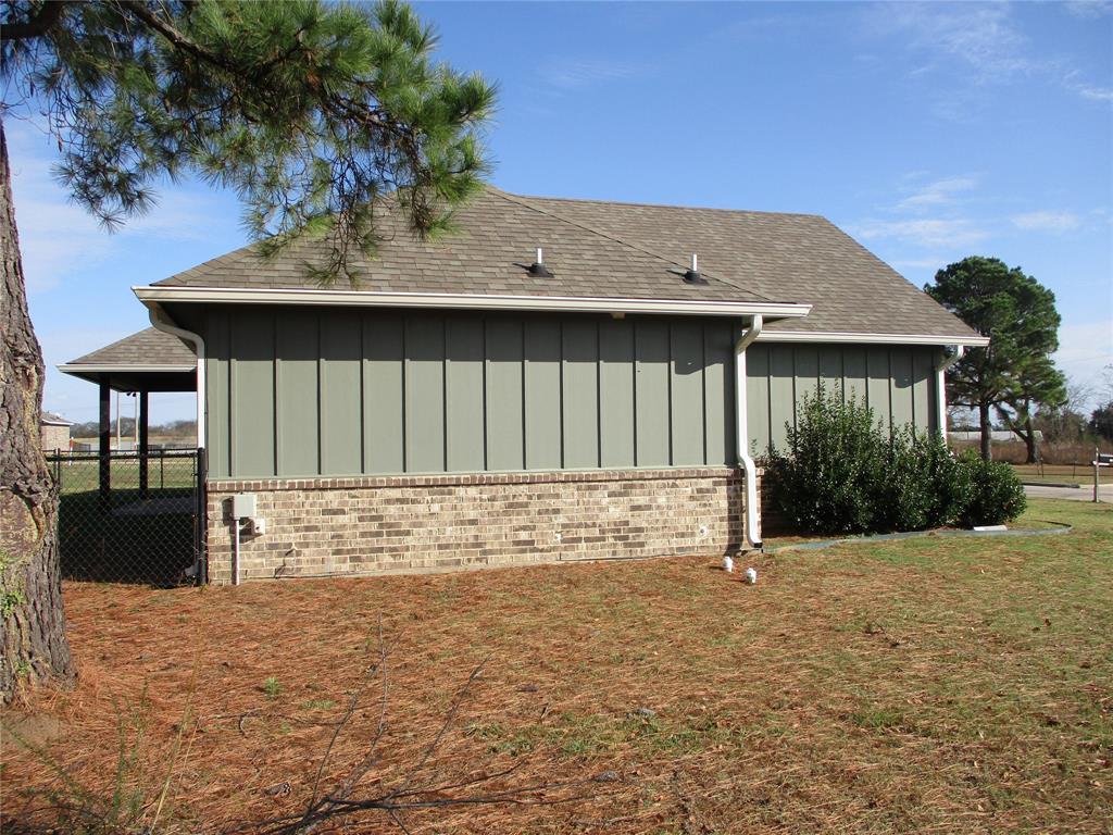 207 Mill Street Emory, TX 75440 - Photo 6 of 34 a view of a house with a yard