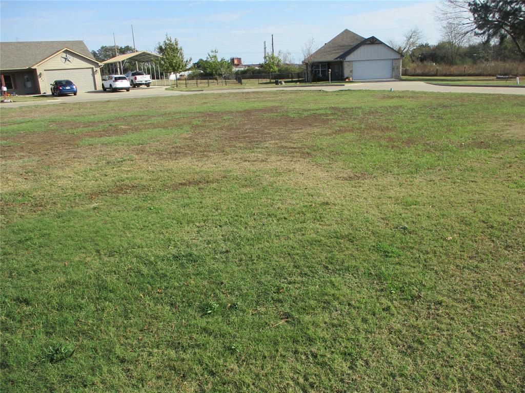 207 Mill Street Emory, TX 75440 - Photo 8 of 34 a view of a big room with table and chairs