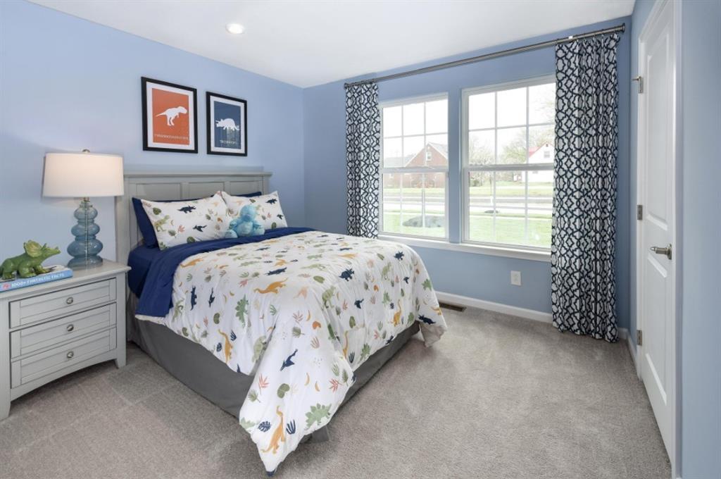 200 Mary Lane Coraopolis, PA 15108 - Photo 11 of 14 a spacious bedroom with a bed and a window