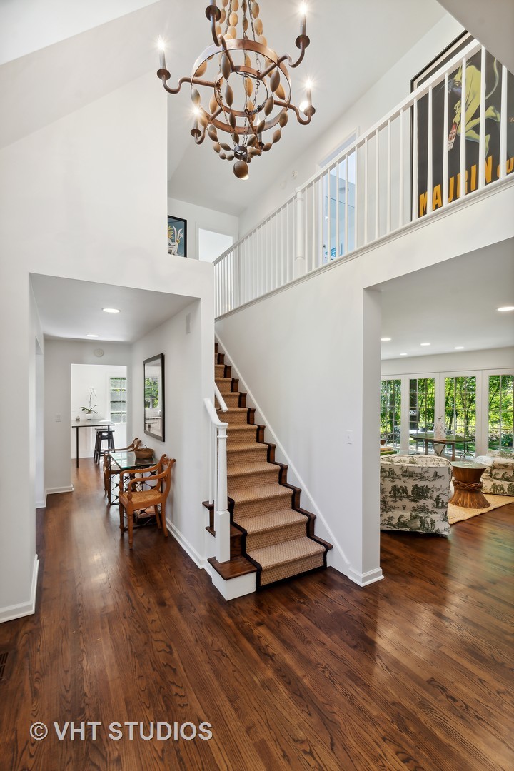 540 Buena Road Lake Forest, IL 60045 - Photo 11 of 37 a view of a livingroom with furniture hardwood floor and a view of living room