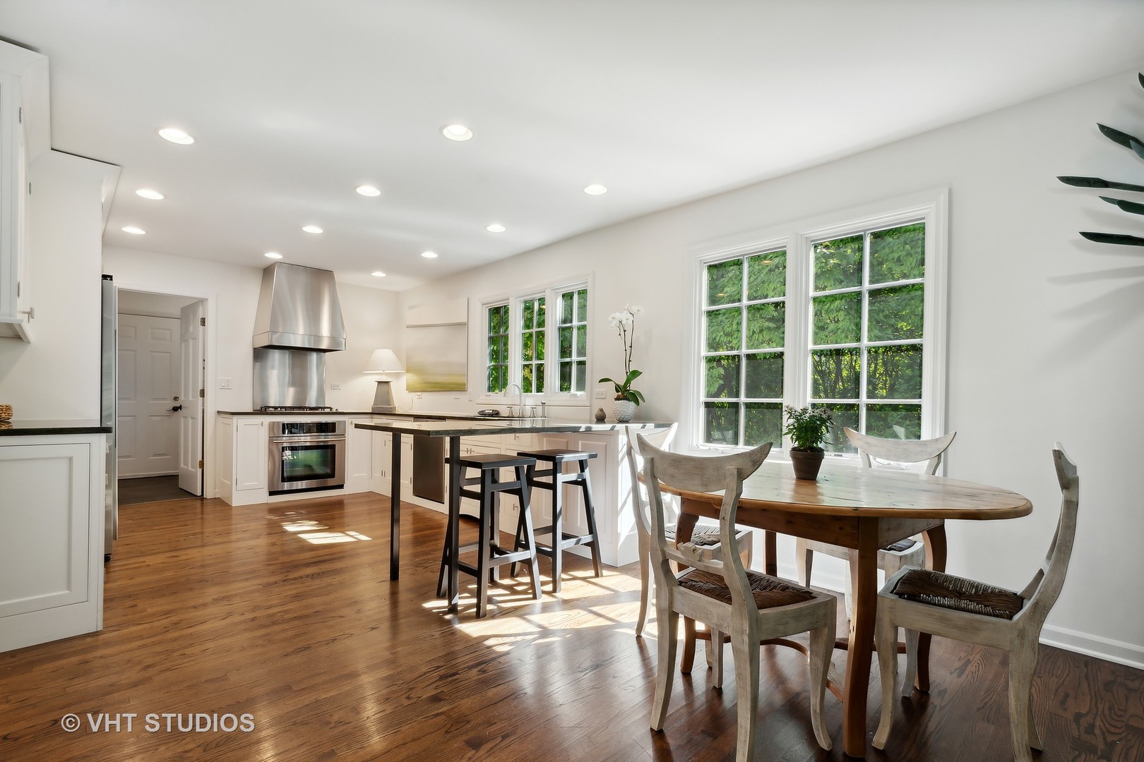 540 Buena Road Lake Forest, IL 60045 - Photo 20 of 37 a view of a dining room with furniture and wooden floor