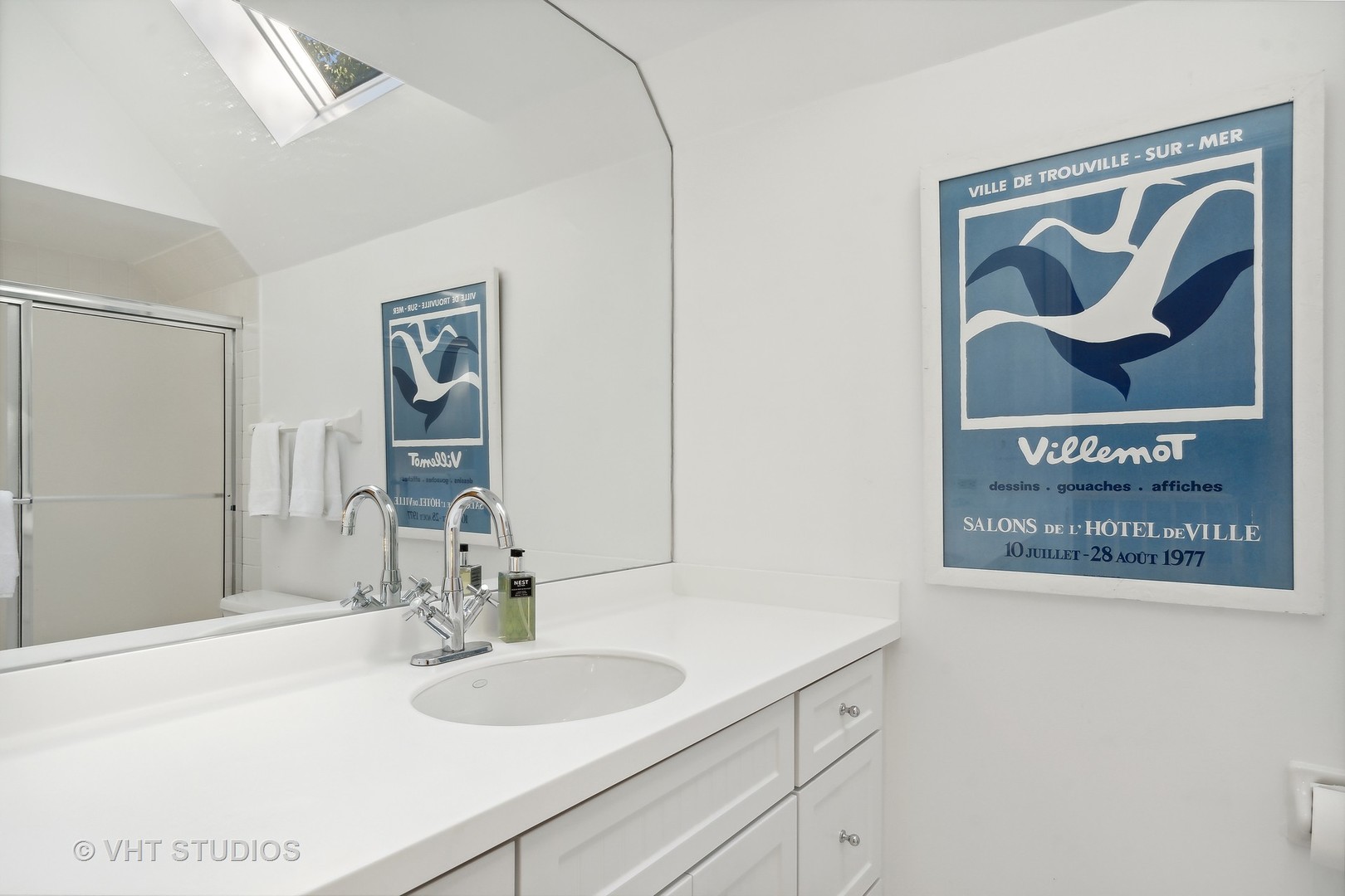 540 Buena Road Lake Forest, IL 60045 - Photo 33 of 37 a bathroom with a sink and a mirror