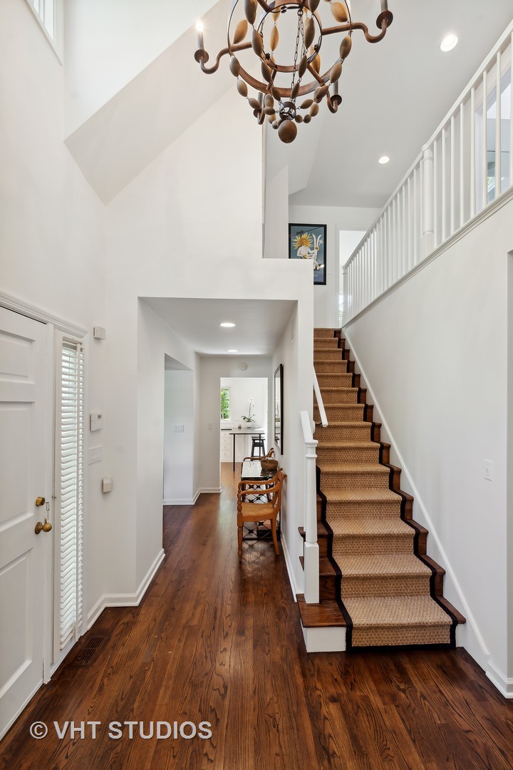 540 Buena Road Lake Forest, IL 60045 - Photo 10 of 37 a view of a room with wooden floor and stairs