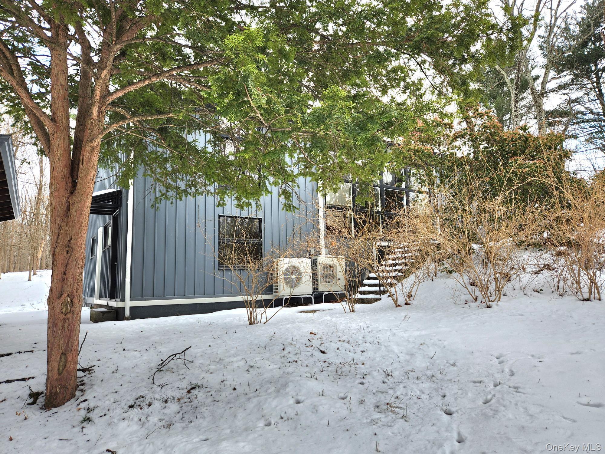 568 River Road Rhinebeck, NY 12572 - Photo 2 of 26 Yard covered in snow with stairway