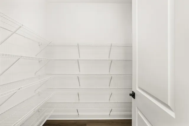 a view of kitchen with sink microwave and stove