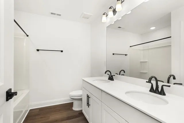 a bedroom with furniture and a couch