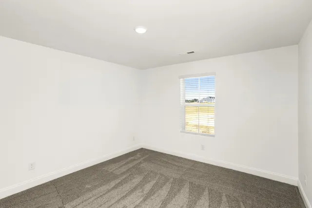 a bath tub sitting next to a shower