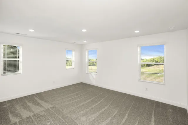 a bathroom with a bath tub and shower