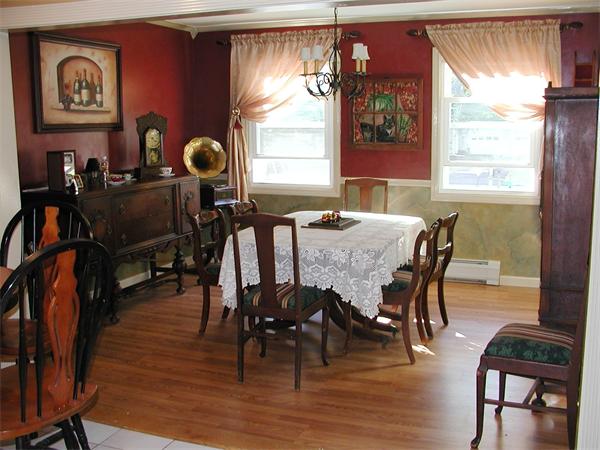 40 Long Plain Road Whately, MA 01373 - Photo 5 of 15 a view of a dining room with furniture window and wooden floor