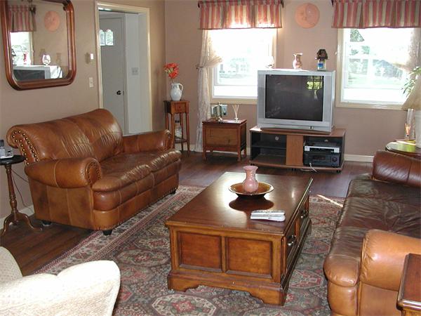 40 Long Plain Road Whately, MA 01373 - Photo 6 of 15 a living room with furniture a flat screen tv and a large window