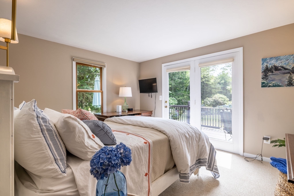 20 Staples Shore Road Lakeville, MA 02347 - Photo 14 of 39 a bed sitting in a bedroom next to a window