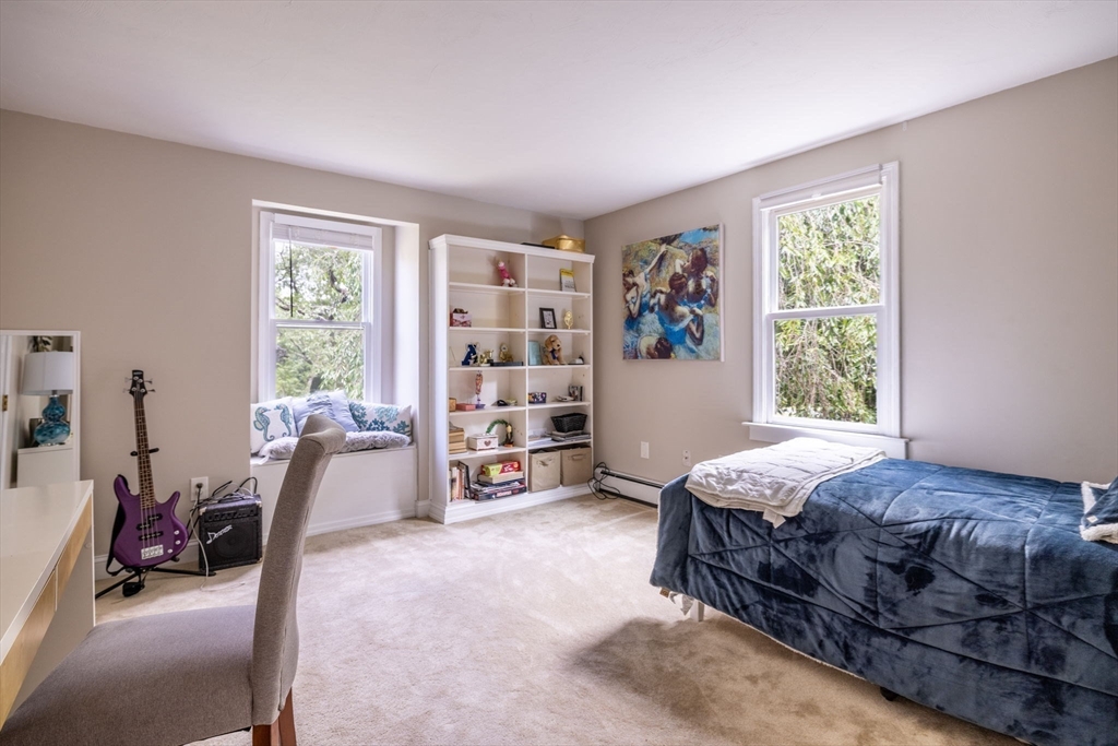 20 Staples Shore Road Lakeville, MA 02347 - Photo 22 of 39 a bedroom with bed and a large window