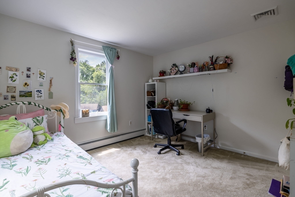 20 Staples Shore Road Lakeville, MA 02347 - Photo 24 of 39 a bedroom with a workspace