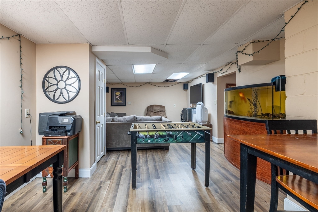 20 Staples Shore Road Lakeville, MA 02347 - Photo 27 of 39 a view of a hallway with a wooden floor