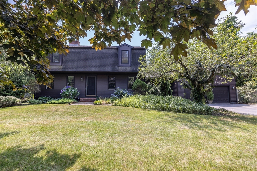 20 Staples Shore Road Lakeville, MA 02347 - Photo 3 of 39 a house view with a garden space