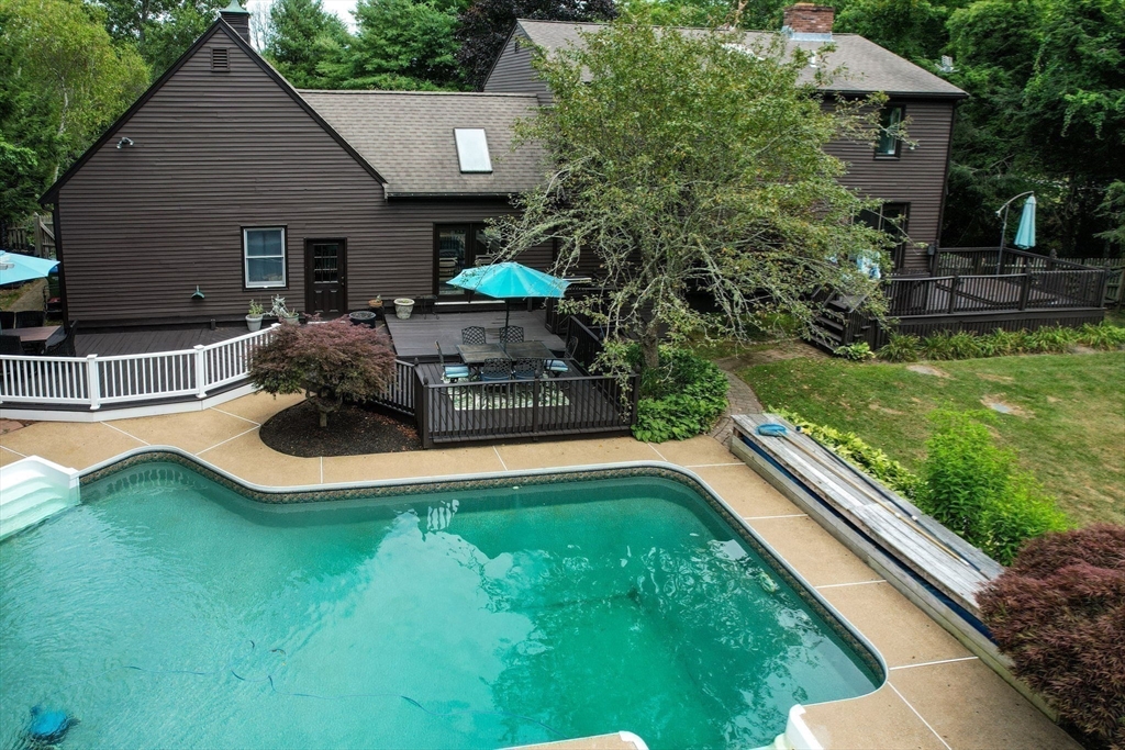 20 Staples Shore Road Lakeville, MA 02347 - Photo 32 of 39 a house with garden in front of it
