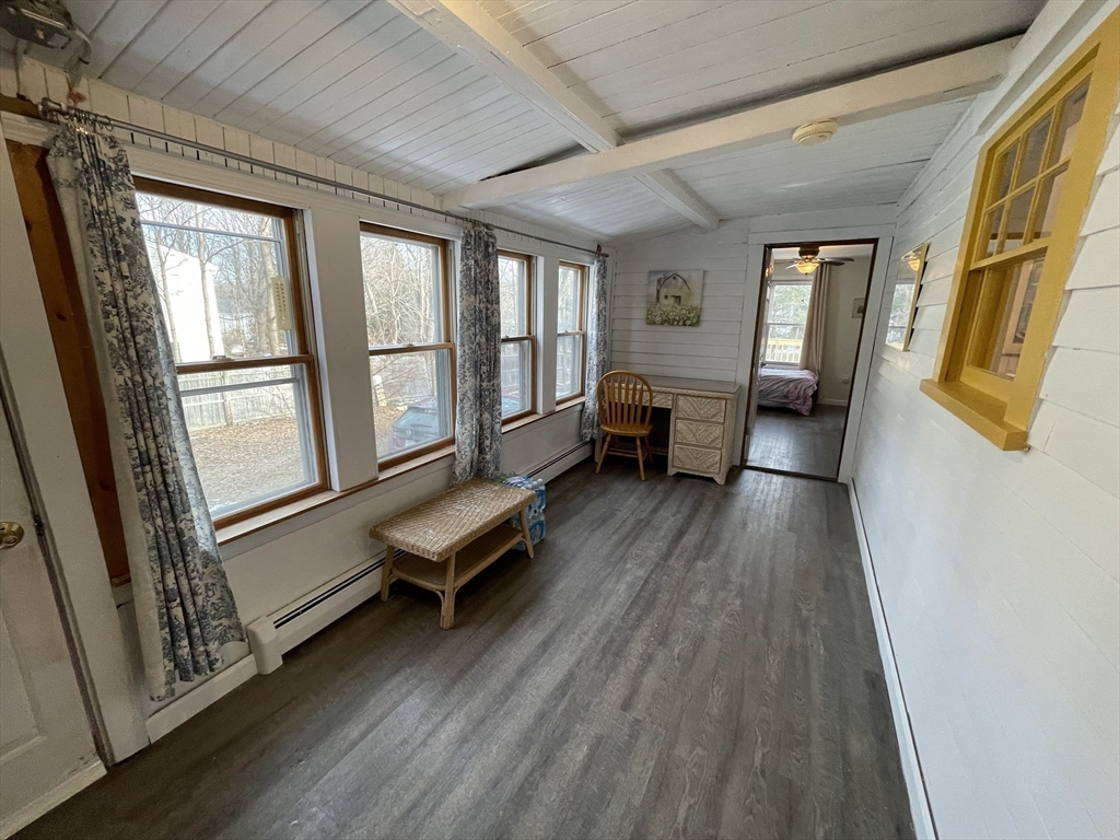 8 Pike Street Hopkinton, MA 01748 - Photo 12 of 34 a living room with furniture and a wooden floor