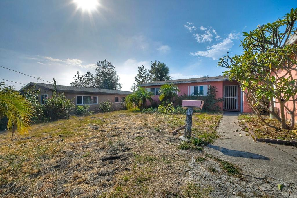4127 Jonathon Street Oceanside, CA 92056 - Photo 3 of 3 a front view of a house with garden