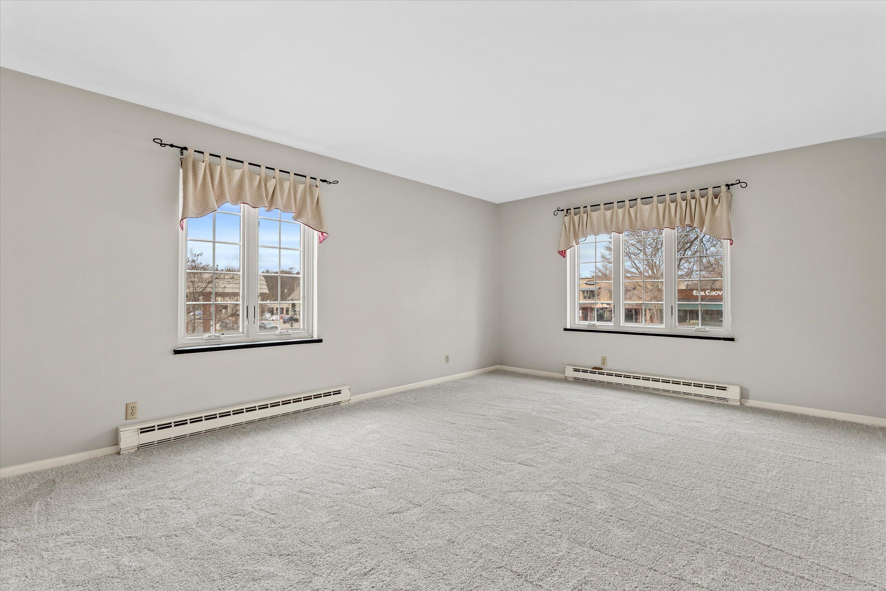 13335 Watertown Plank Road, Unit 105 Elm Grove, WI 53122 - Photo 18 of 40 Primary Bedroom