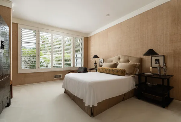 a view of a bedroom from a hallway