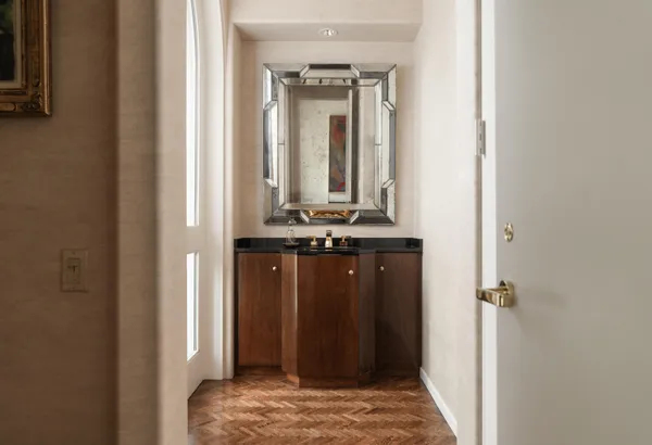a view of a swimming pool and lounge chairs