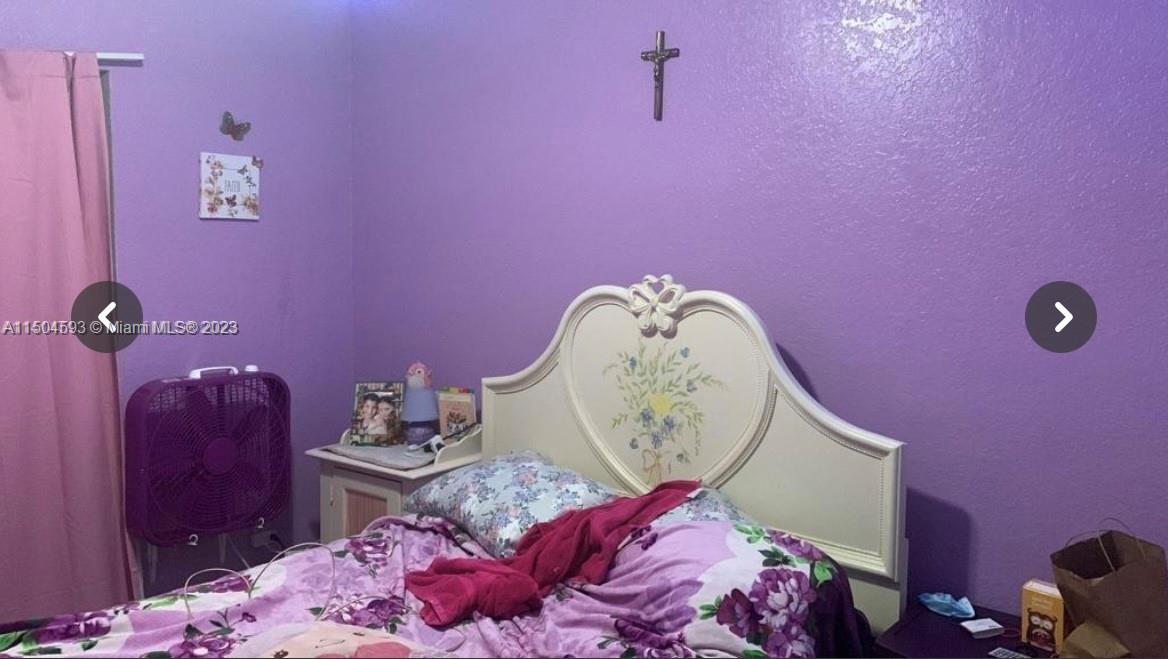 Gladeview Miami, FL 33147 - Photo 7 of 10 a bed room with a bed