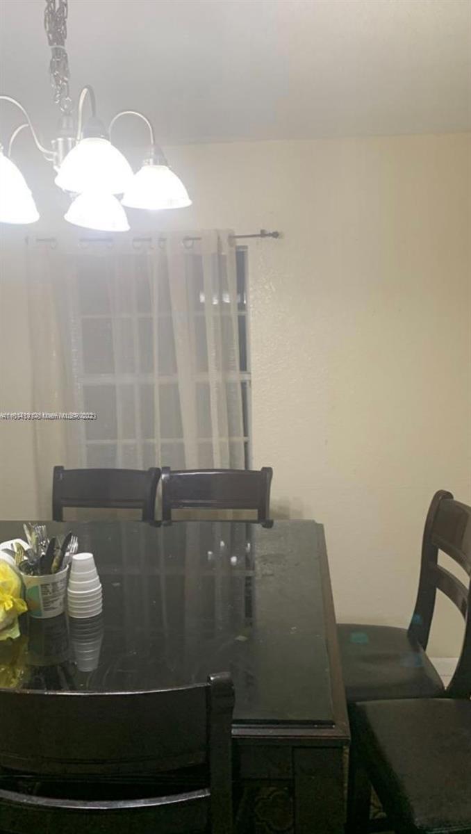 Gladeview Miami, FL 33147 - Photo 9 of 10 a bathroom with a sink and a mirror