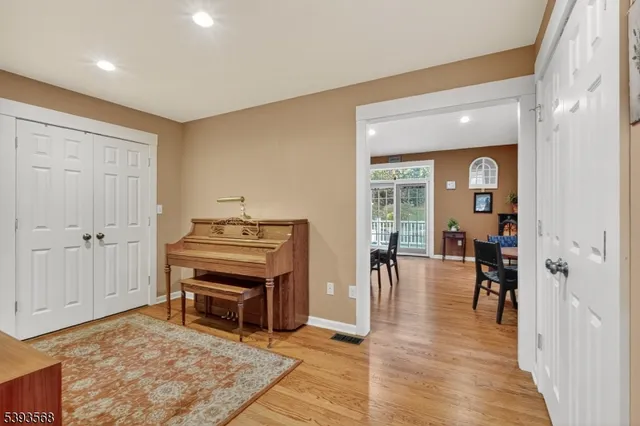 a view of a livingroom with furniture and wooden floor