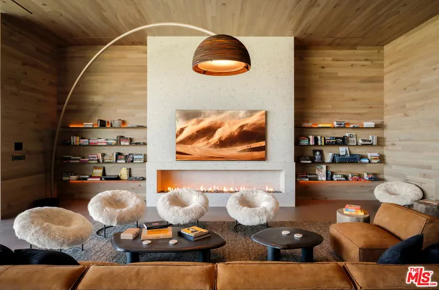 a view of a chairs and table in patio