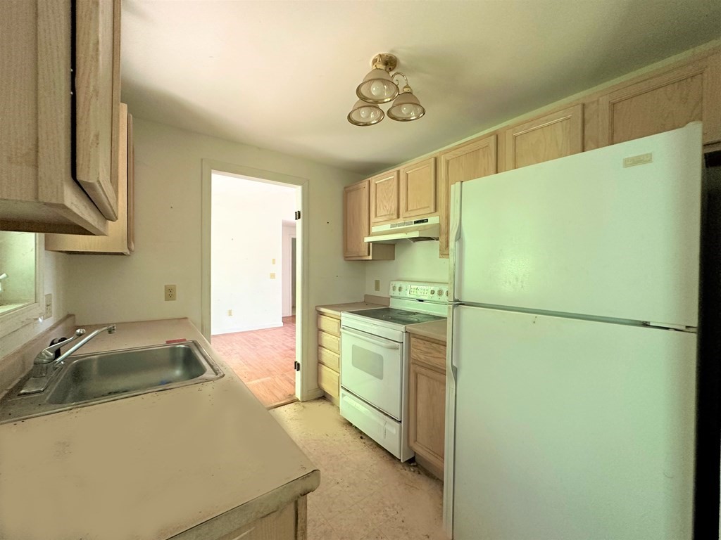 380 Cutler Road Barre, MA 01005 - Photo 13 of 13 a kitchen with a refrigerator sink and stove